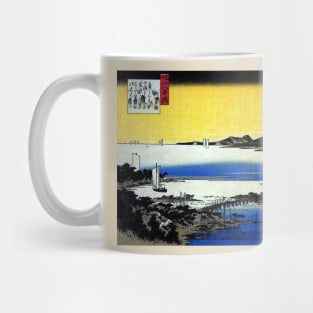 View of a long bridge across a lake Mug